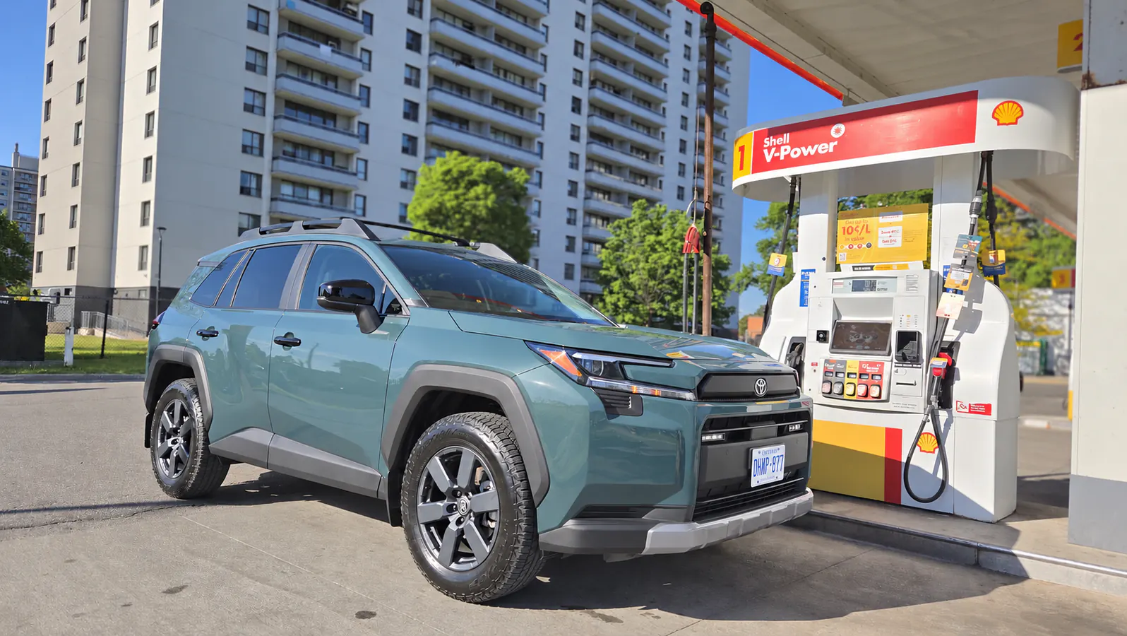 2026 Toyota RAV4 parked beside a Shell fuel pump